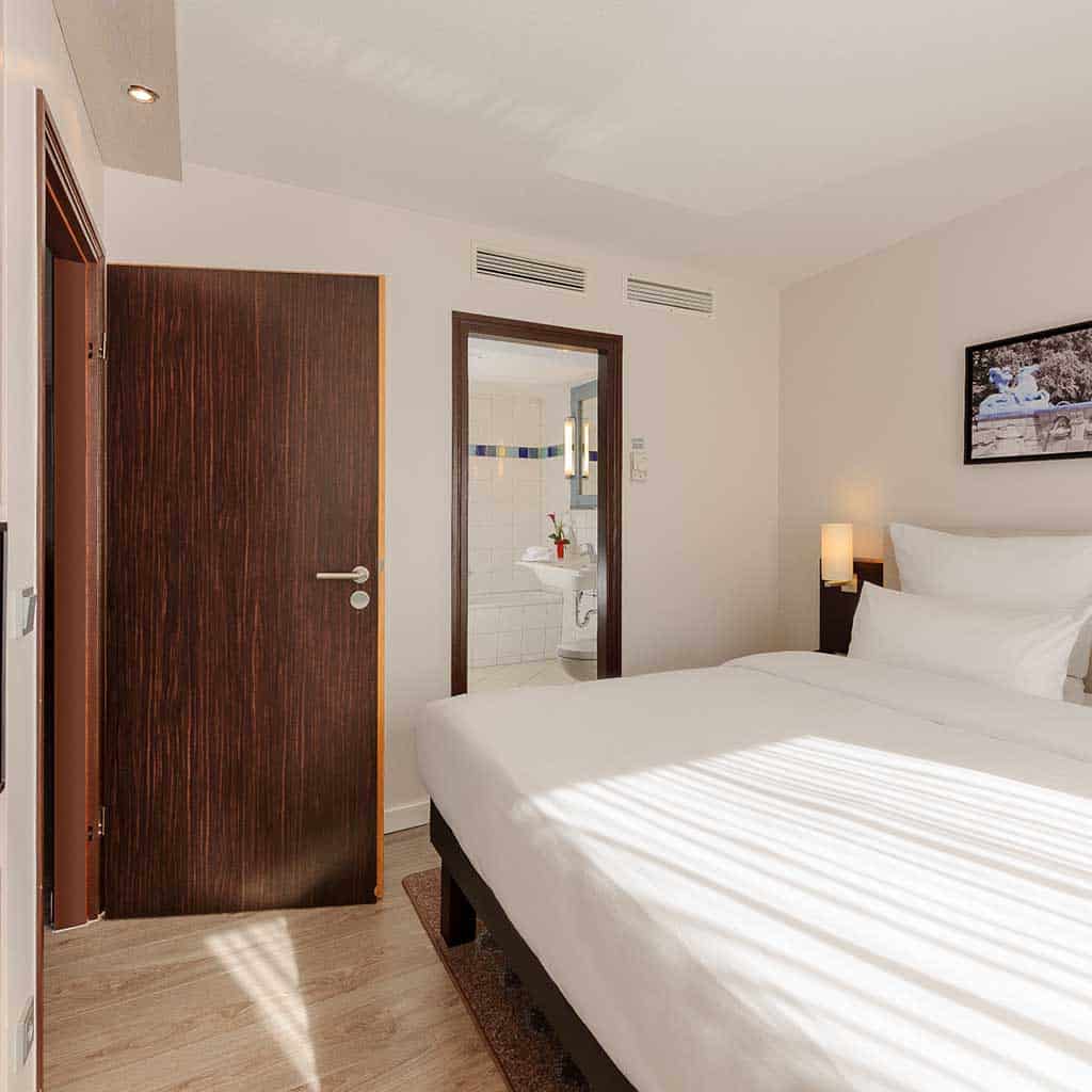 Mercure Hotel München Süd Messe 5 Mercure Hotel München Messe Süd Suite Bett